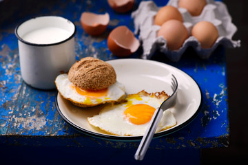 Breakfast  fried Eggs with buns and cheese