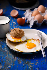 Breakfast  fried Eggs with buns and cheese