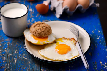 Breakfast  fried Eggs with buns and cheese