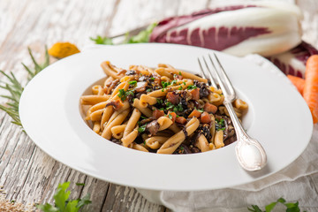 casarecce pasta with chicory chickpeas  sesame seeds and turmeric spice