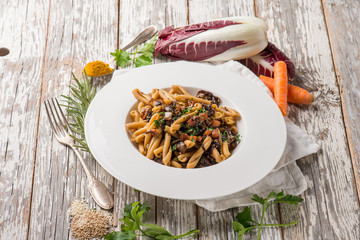 casarecce pasta with chicory chickpeas  sesame seeds and turmeric spice