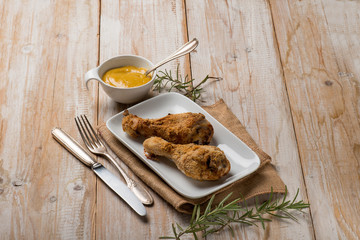 baked chicken legs with mustard and rosemary
