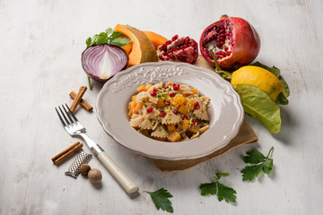 butterfly pasta with pumpkin pomegranate and spices