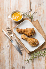 baked chicken legs with mustard and rosemary