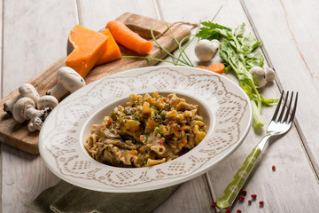 pasta with mushroom pumpkin carrots anf red pepper