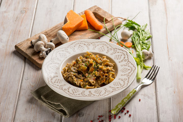 pasta with mushroom pumpkin carrots anf red pepper