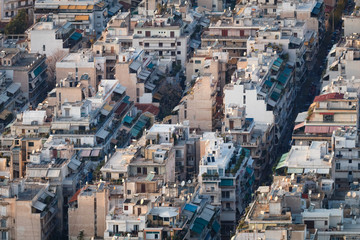 Skyline with mass of houses, buildings, apartments, rooftops in the city center of Greek capital - concept urban development town planning structure living condition. Athens, Greece