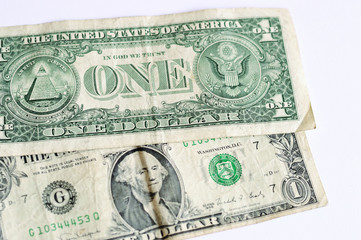one dollar bills on white surface