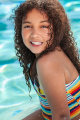 African American Biracial Girl Child In Swimming Pool