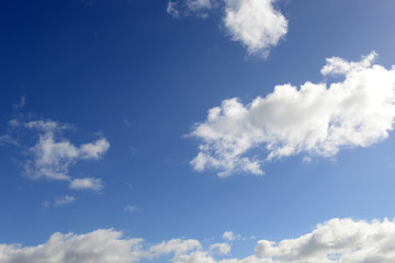 Fototapeta na wymiar Blue Sky Background With White Clouds