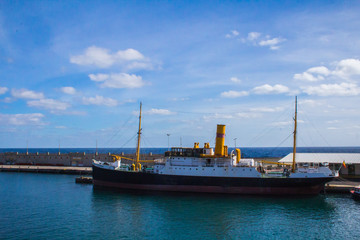 ship in the harbor of Santa Cruz de Tenerife with a blue sky with clouds