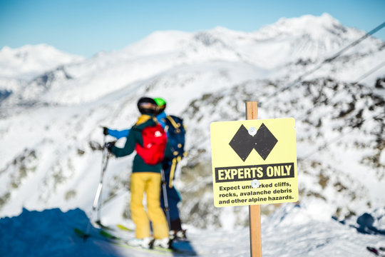 A experts only sign indicating a double black diamond run on the top of Blackcomb mountain.