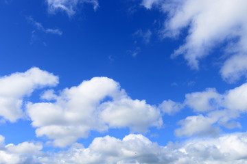 Obraz na płótnie Canvas Blue Sky Background With White Clouds