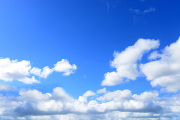Fototapeta na wymiar Blue Sky Background With White Clouds