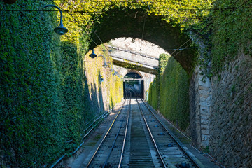 Bergamo, Italy Jan 25, 2019 - The red funicular in the old city of Bergamo is approaching the station at San Vigilio hill
