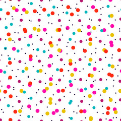 Festive pattern with colorful little circles. Chaotic polka dot background. Abstract round seamless pattern. Dotted texture. Vector illustration.