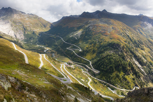 Twisting roads of the Furka and Grimsel Alpine Passes meet at the hamlet of Gletsch, Canton of Valais