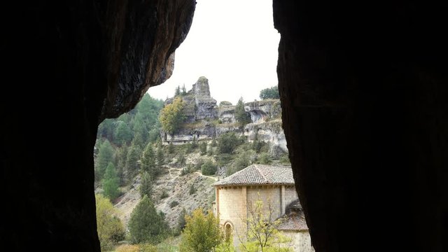 San Bartolome Hermitage in Canyon of Wolves River from cave, Soria Spain