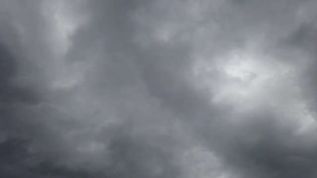 Timelapse of overcast stormy sky with clouds blown by the wind