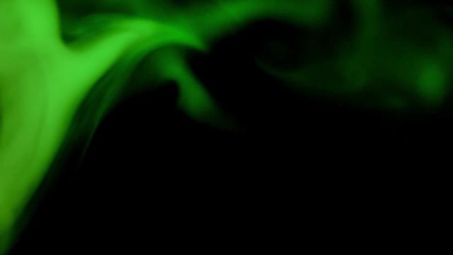green smoke patterns connection at dark background
