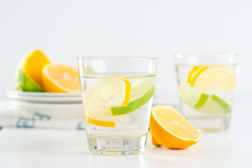 glass of water with lemon and lime