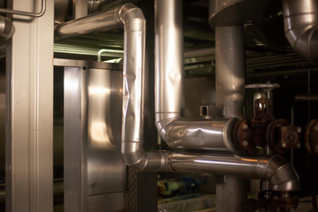 A pressure gauge inside of a beer plant brewery