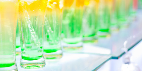 Green cocktail witn rum and mint, selective focus