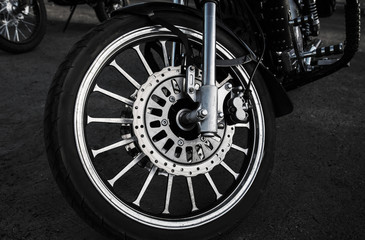  wheel motorcycle. bike wheel close-up, biker background.