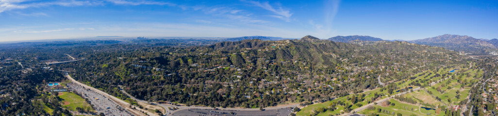 Fototapeta na wymiar Aerial view of the famous Brookside Golf & Country Club and Altadena area with Mountains