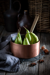 Ingredients for mulled wine with pears and cinnamon