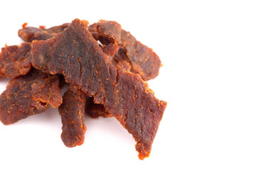 Pile of Mild Flavored Beef Jerky on a White Background
