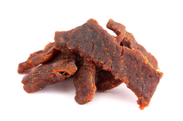 Pile of Mild Flavored Beef Jerky on a White Background