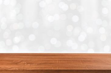  Brown wooden  table with bokeh blur background.
