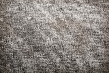 Texture of gray faded jeans for backgrounds 
