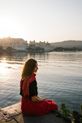 Traveler enjoying a view of Taj Lake in Udaipur, India