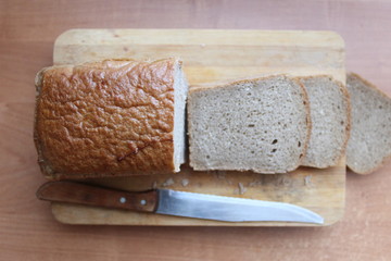 Bread on the table, sandwich, lots of food, bread always
