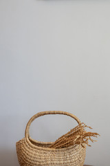 rice in basketry isolated on gray background. concept for traditional hand craft