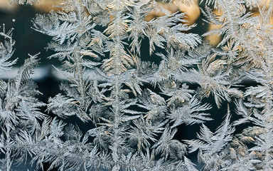 beautiful frosty patterns on glass