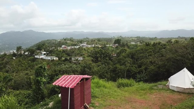 AERIAL: moving and panning to better reveal the mountain tops of Utuado, Puerto Rico.