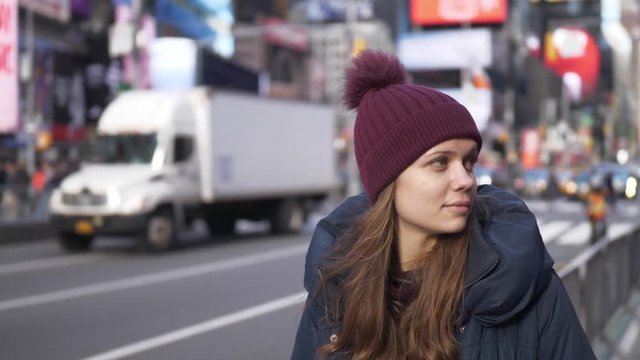 Young beautiful woman in the streets of New York for sightseeing