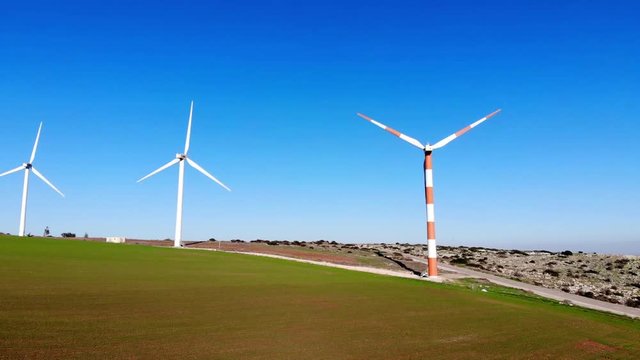 Hovering over wind farms , up, down, left, right on a clear day and clean visibility