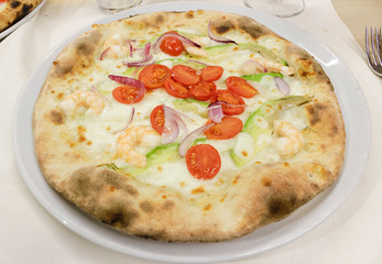 pizza with quinoa flour, avocado, shrimp, cherry tomatoes, onion.