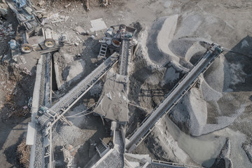 Aerial view of crushed stone quarry machine in a construction material factory 