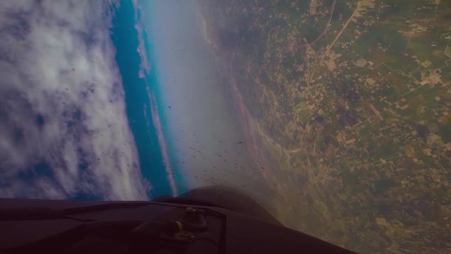 Fighter jet following the figher jet with moving back in the sky, beautiful flying in blue sky and clouds, cockpit mirror is a bit dusty
