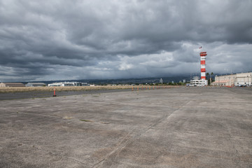 Military base airport runway with control tower