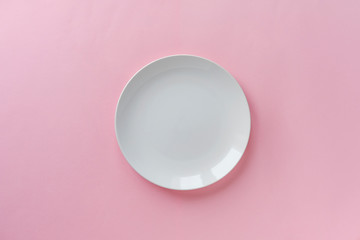 Single empty clean white ceramic plate