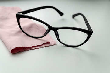 black glasses on a white background