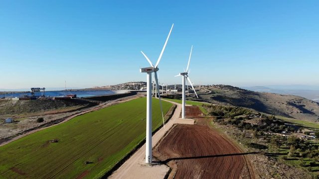 Hovering over wind farms , up, down, left, right on a clear day and clean visibility