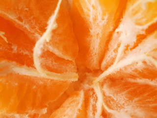 Macro texture of an open mandarin.