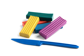 Colored plasticine isolated on white background. 